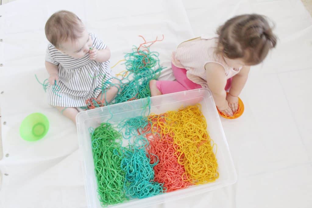 Sensory activities for baby and toddler- rainbow spaghetti!