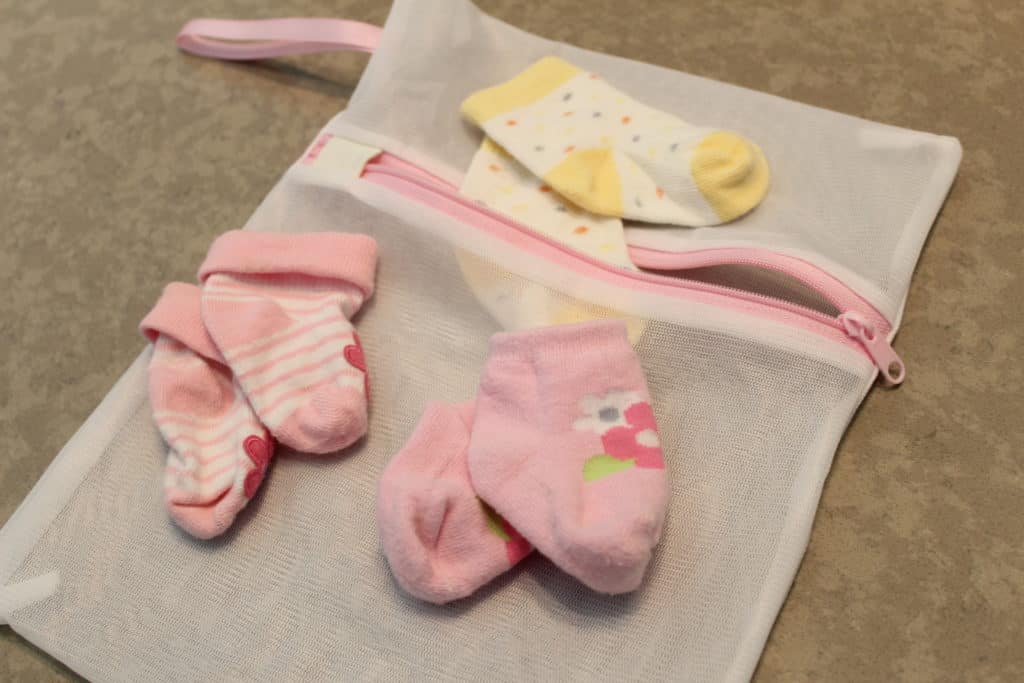 Wash baby socks in a mesh bag to make matching easier and to avoid losing any in the wash